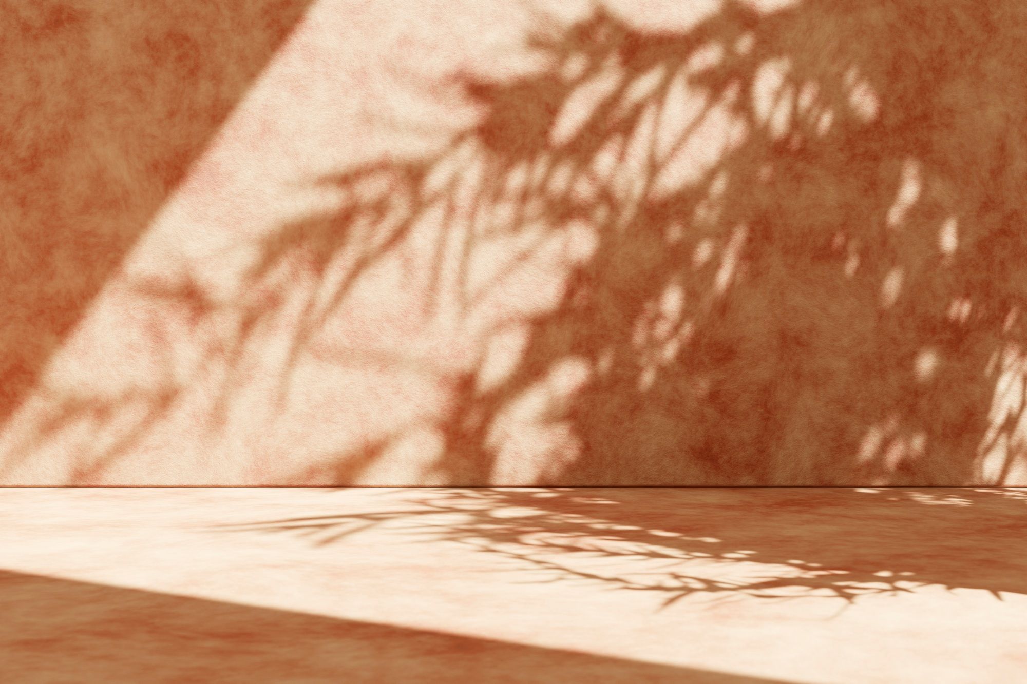 Concrete wall background with plant shadow.